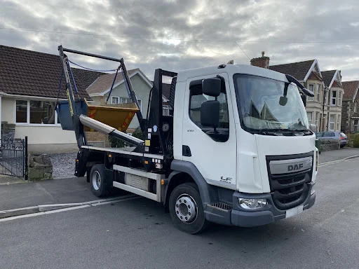 GREG LANGSON trading as BS RECYCLING AND SKIP HIRE